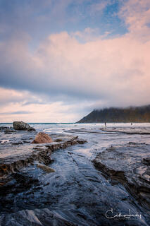 a vertical image of Skagsanden beach int he Lofoten Islands in the fall.