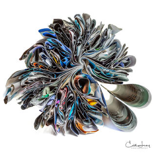 Fine art photograph of folded Seajet Magazine in the shape of hearts