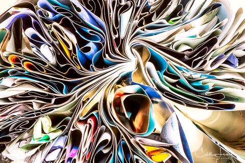 Fine art photograph of folded Seajet Magazine . Abstract with vibrant colours