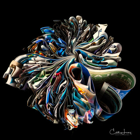 Fine art photograph of folded Seajet Magazine in the shape of hearts