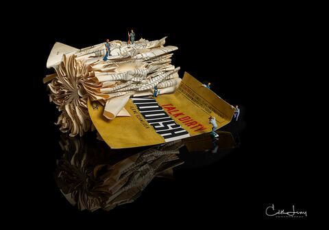 Fine art photo of an abstract folded book, featuring miniture figures forming geometric patterns , created by Toronto based photographer, Edith Levy