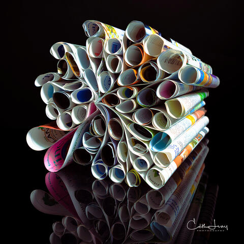 Fine art photograph of a folded copy of Martha's Vineyard magazine in the shape of hearts