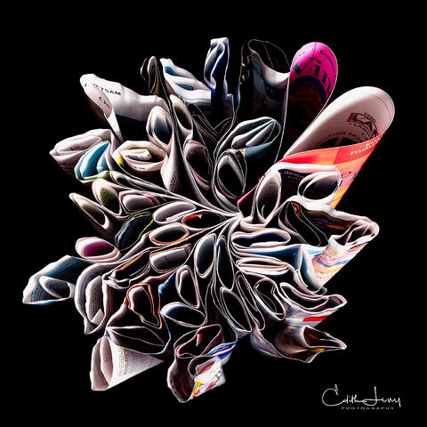 Fine art photograph of a folded copy of Martha's Vineyard magazine in the shape of hearts