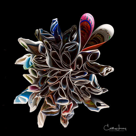 Fine art photograph of a folded copy of Martha's Vineyard magazine in the shape of hearts